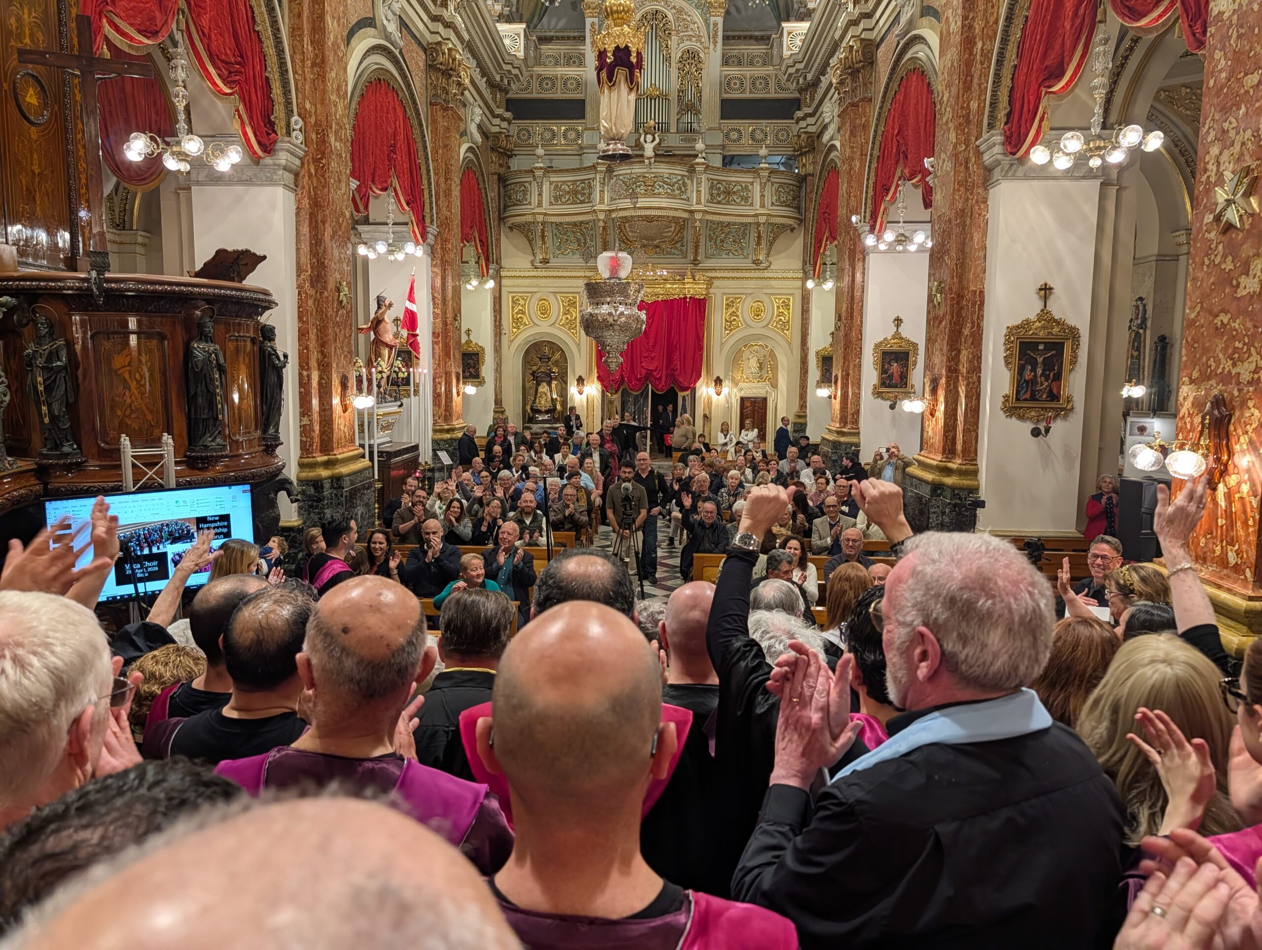 Chorus performing in a Maltese church
